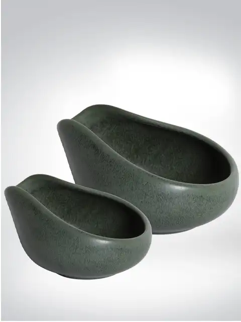 Two grey-toned stone bowls in minimalist design