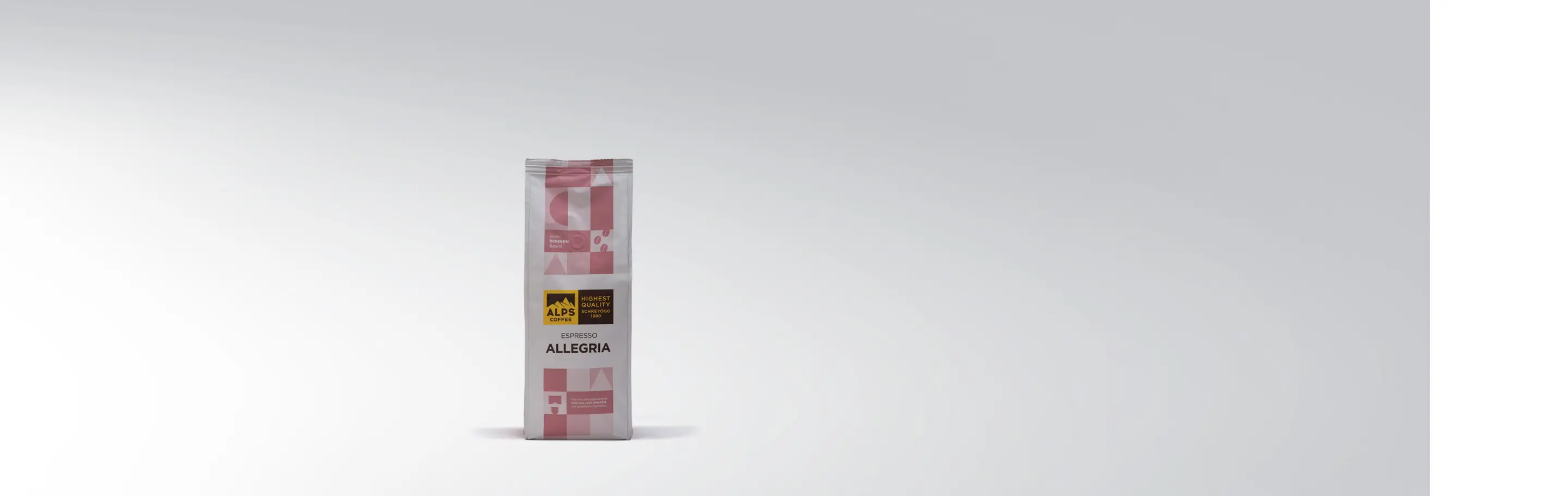 Eine Packung Espresso Allegria von Alps Coffee mit rosa und weißem Design auf grauem Hintergrund