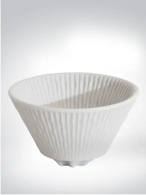 White ceramic bowl with ribbed pattern