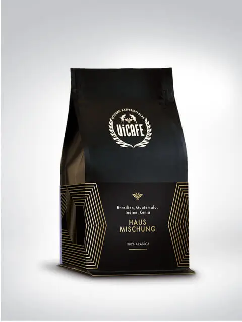 Schwarze Verpackung von Vícafe Hausmischung mit 100% Arabica Kaffee aus Brasilien, Guatemala, Indien und Kenia