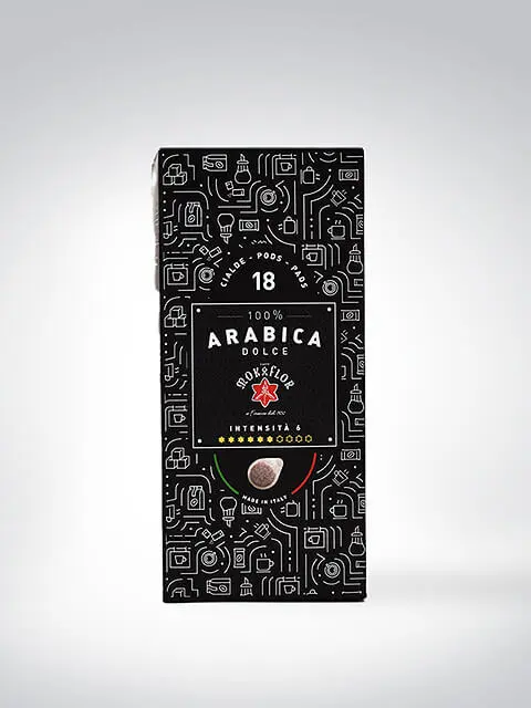 Schwarze Kaffeekapselpackung mit dekorativem Muster, 100% Arabica Dolce, 18 Kapseln, Intensität 6 von 8