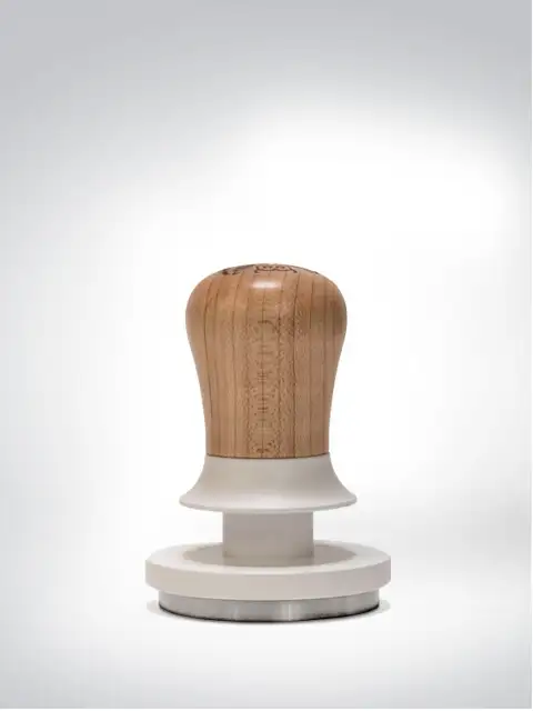 A stylish wooden coffee tamper with a white base, perfect for espresso