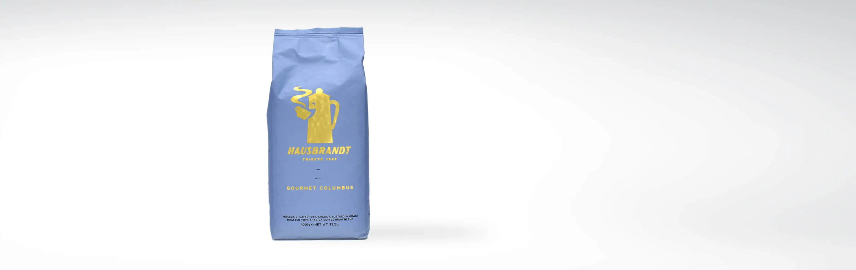 Verpackung von Hausbrandt Gourmet Columbus Kaffee, 1000g, mit blauem Design und goldener Aufschrift