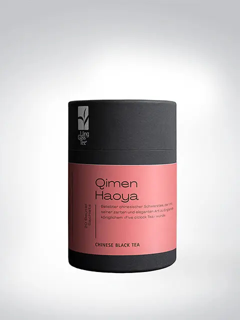 Verpackung des Qimen Haoya Tees mit Aufschrift 'Chinese Black Tea', stilvolles Design in Schwarz und Rosa