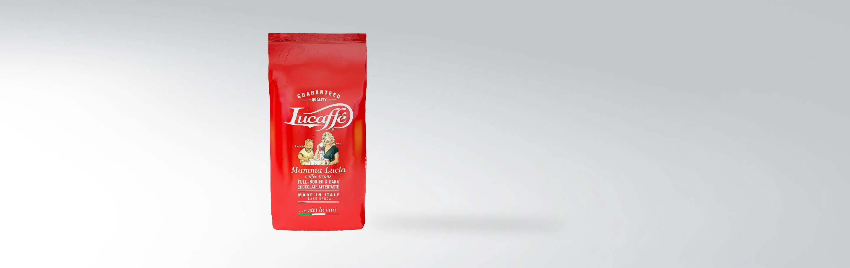 A red package of Lucaffè Mamma Lucia Coffee Beans, 1kg, on a light background