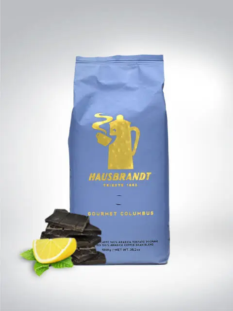 Pack of Hausbrandt Gourmet Columbus Coffee decorated with lemon and chocolate